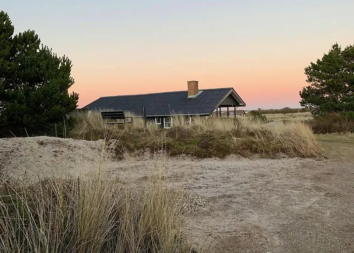 House Among Dunes And Trees In Sondervig *